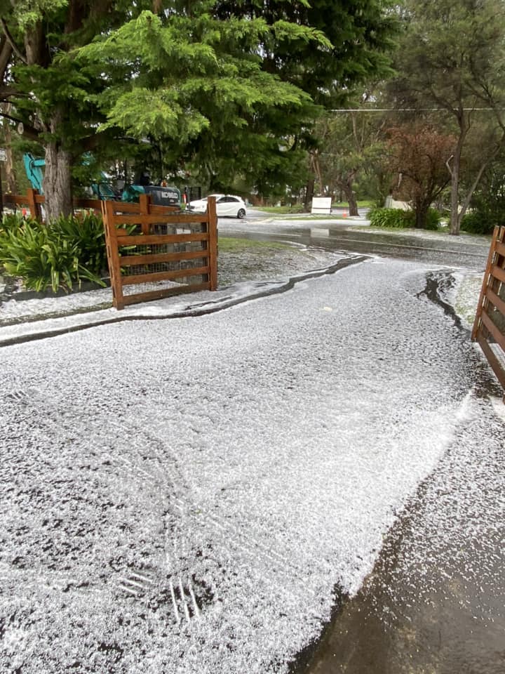 A driveway covered in hail.