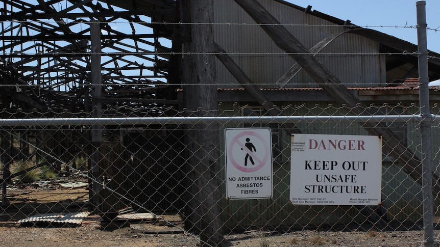 very old buildings behind fencing