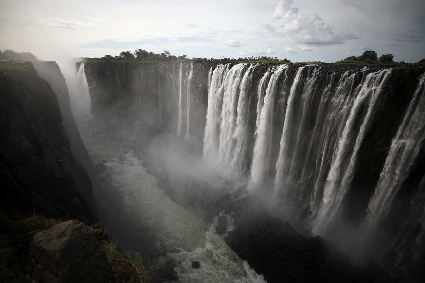 Photo shows Victoria Falls as usual with heavy flow.