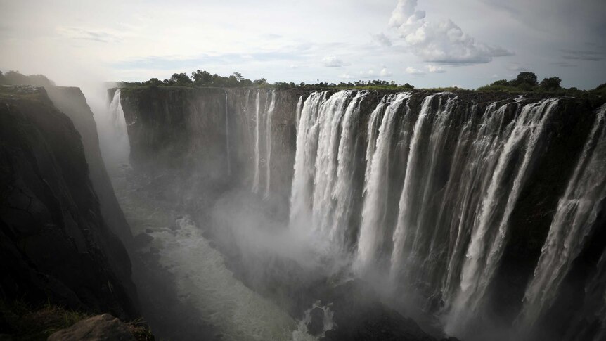 Photo shows Victoria Falls as usual with heavy flow.