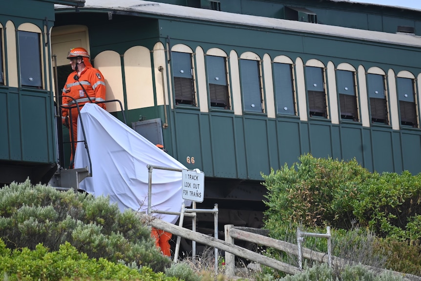 Emergency workers next to the Cockle Train.