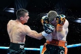 Tim Tszyu (left) strikes Jeff Horn.