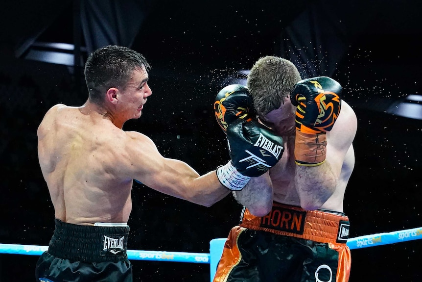 Tim Tszyu (left) strikes Jeff Horn.