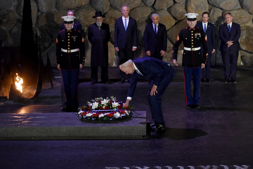 President Joe Biden participates in a wreath-laying ceremony at Yad Vashem Holocaust Memorial Museum.