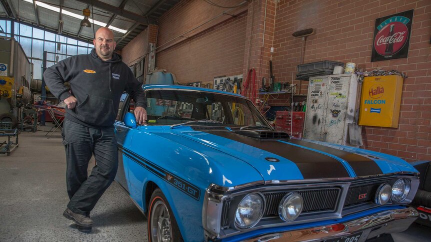 Jason Horder stands next to his 1971 XY GTHO Phase 3