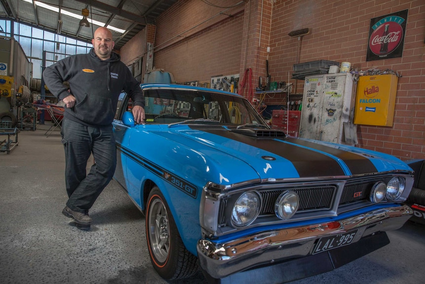 Jason Horder stands next to his 1971 XY GTHO Phase 3