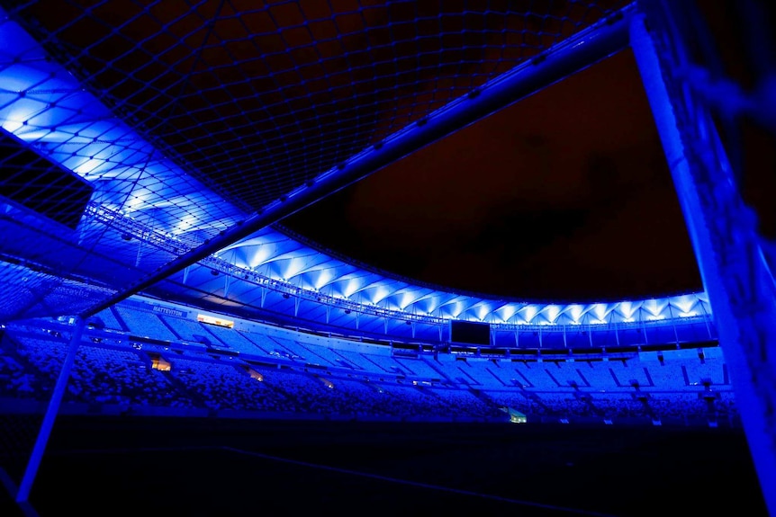 Maracana Stadium in Rio de Janeiro lit up in blue for UN 70th anniversary