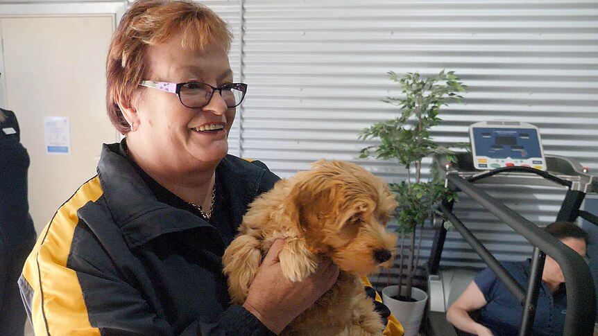 Carmel Kaczmar with therapy dog Coco