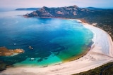 Aerial picture of a very picturesque bay with beautiful blue water on Flinders Island Tasmania