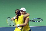 Gold medal hug in doubles