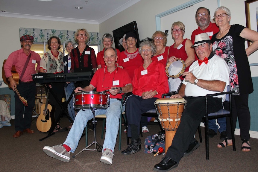 The Hawthorn house band gather at the Bethel Residential Aged Care Facility in Albany.
