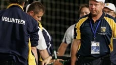 Broken leg ... Jason Petkovic being stretchered off against the Mariners