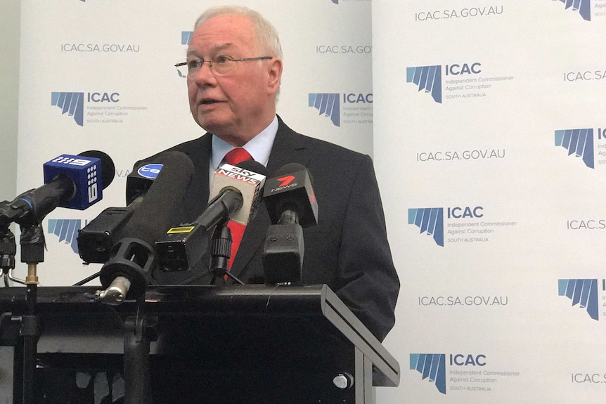 Bruce Lander speaks at a press conference in Adelaide.