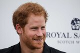 Prince Harry is all smiles as he arrives at a Polo event in Florida