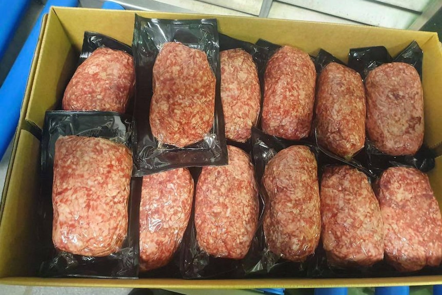 Packets of vacuum-sealed beef mince.