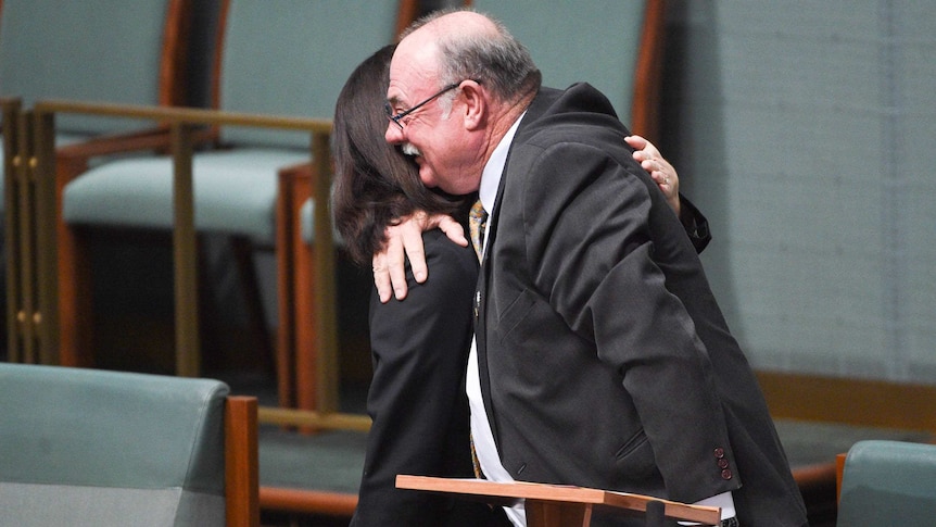 Terri Butler hugs Warren Entsch