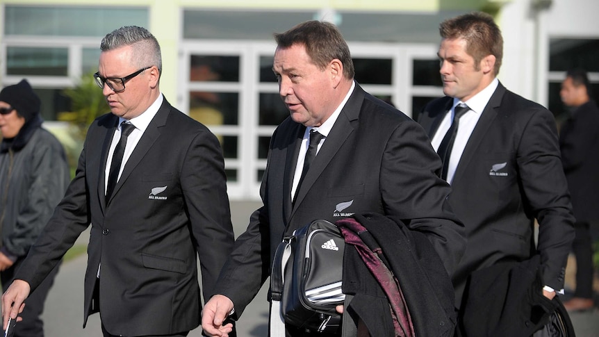 Fondly remembered ... All Blacks coach Steve Hansen (C) and captain Richie McCaw (R) attending the funeral for Jerry Collins