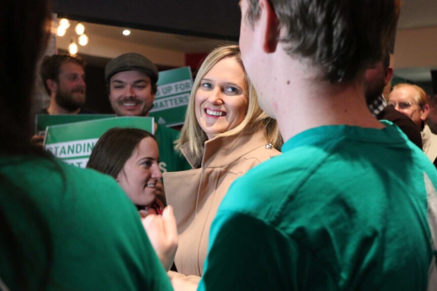 Greens Senate candidate for the ACT Christina Hobbs greets supporters.