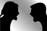 Silhouettes of a man and woman screaming