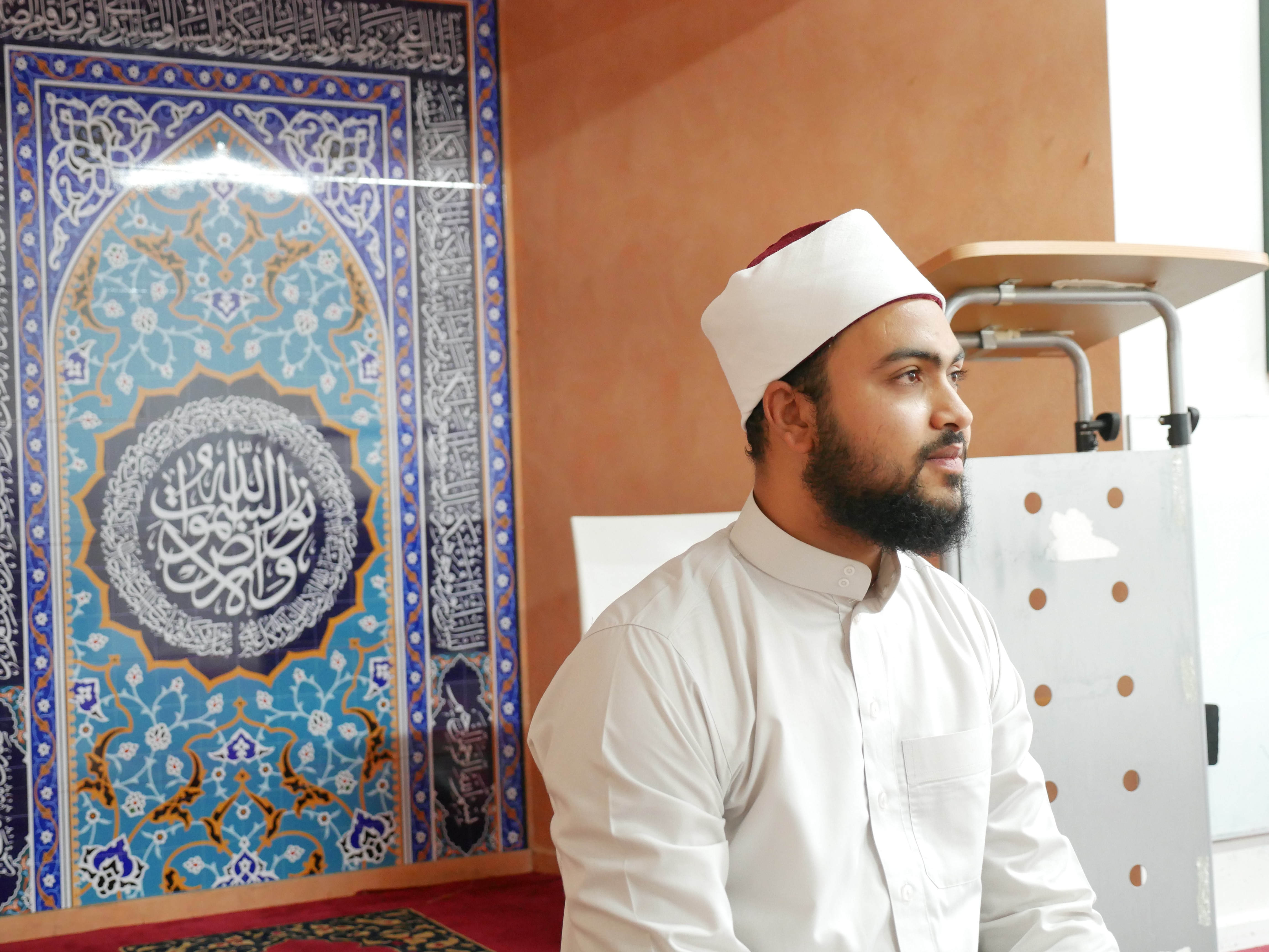 The Imam of Alice Springs looks deep in thought inside his mosque.