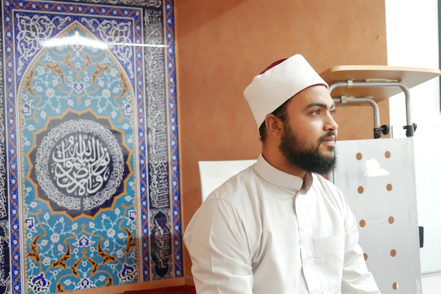 The Imam of Alice Springs looks deep in thought inside his mosque.