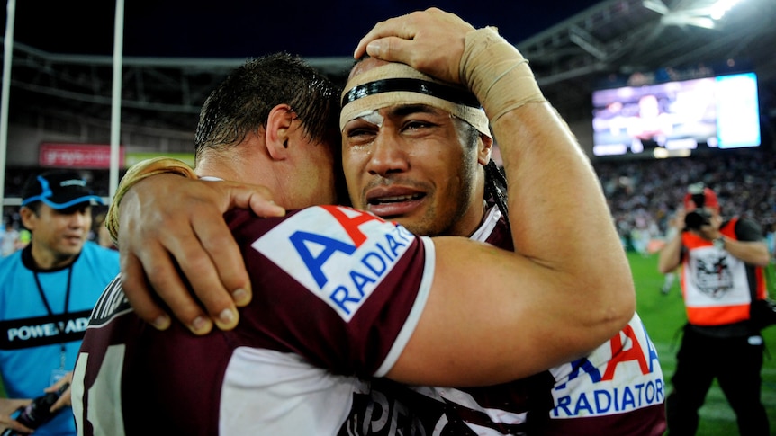 Steve Matai crying whilst hugging Watmough after grand final win