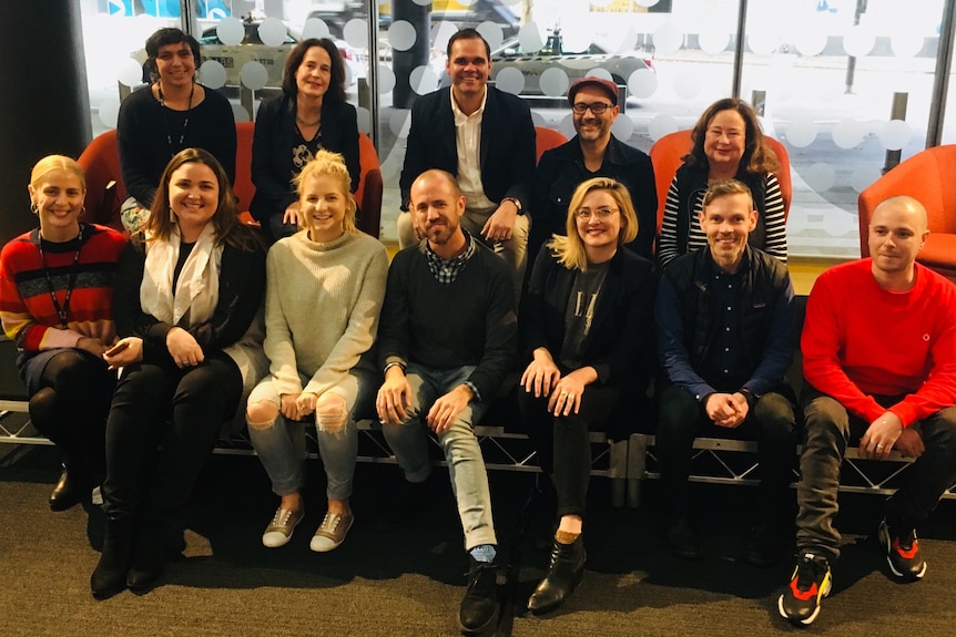 Group shot of 12 ABC staff who worked on story.