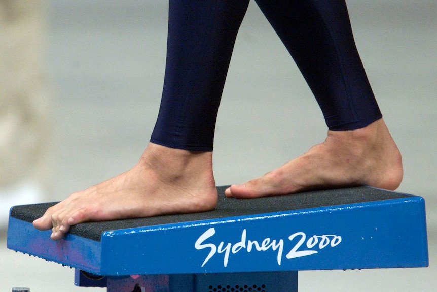 Ian Thorpe's huge feet on the starting block.