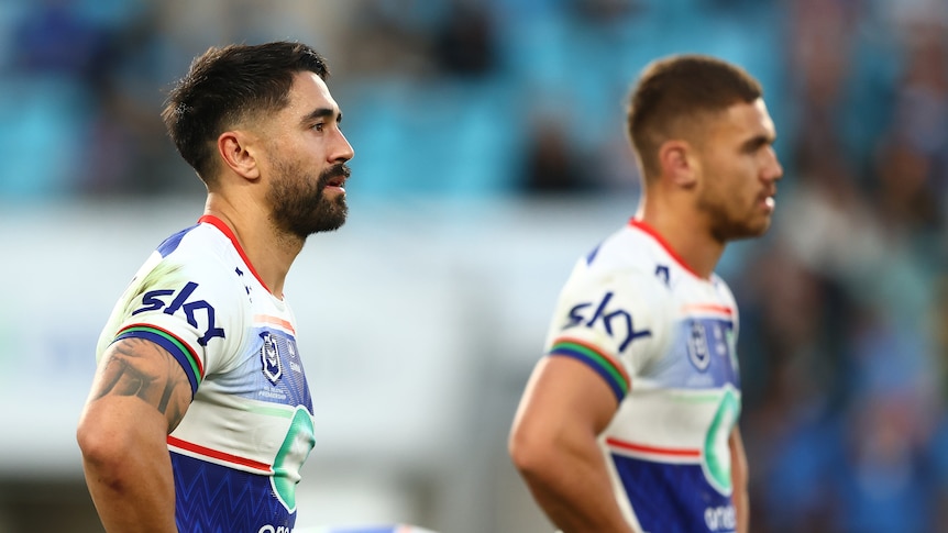 Shaun Johnson stands with his hands on his hips