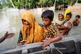 Mother and son in Bangladesh flood