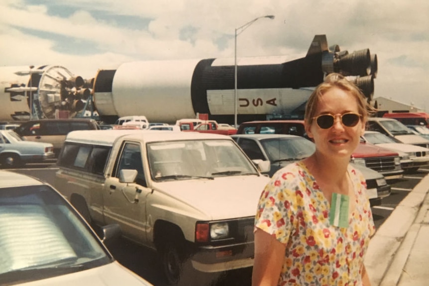 Ferguson standing in front of space shuttle.