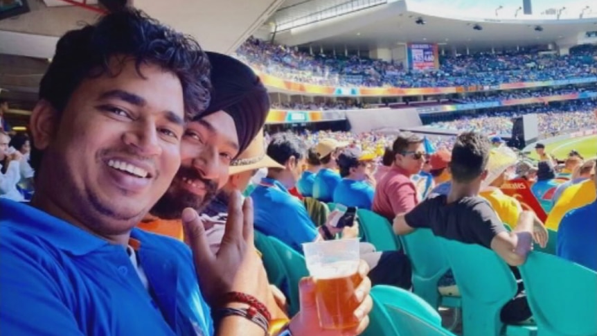 Pankaj Saw (L) pictured here at the India vs Australia Cricket World Cup in Sydney, fell from a top-floor balcony and died.