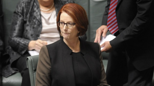 Prime Minister Julia Gillard listens during Question Time.