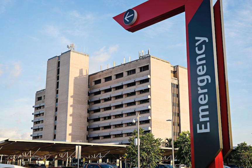 A photograph of Royal Darwin Hospital, with a large 'Emergency' arrow pointing to the main entrance.