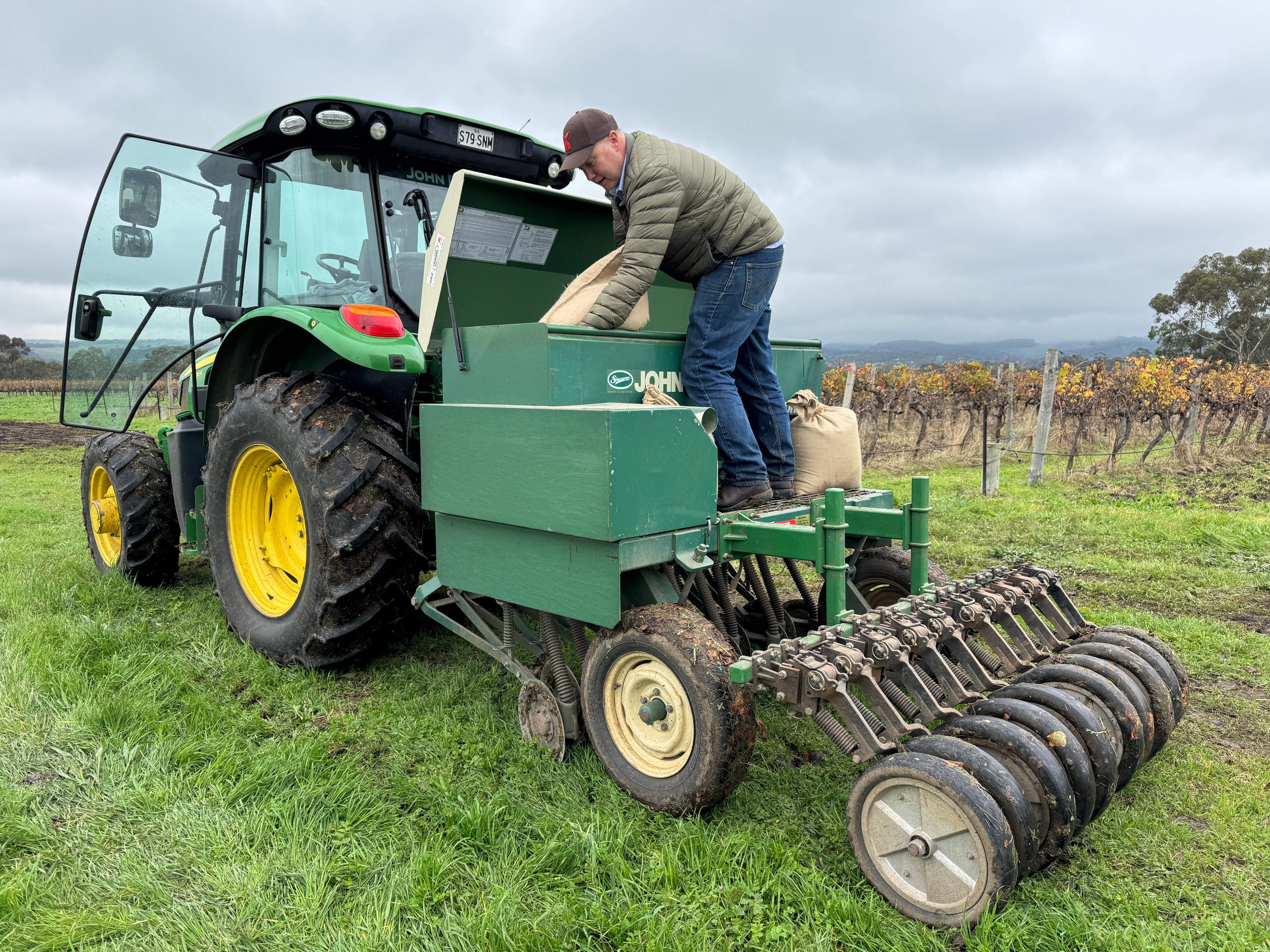 A man on a tractor.