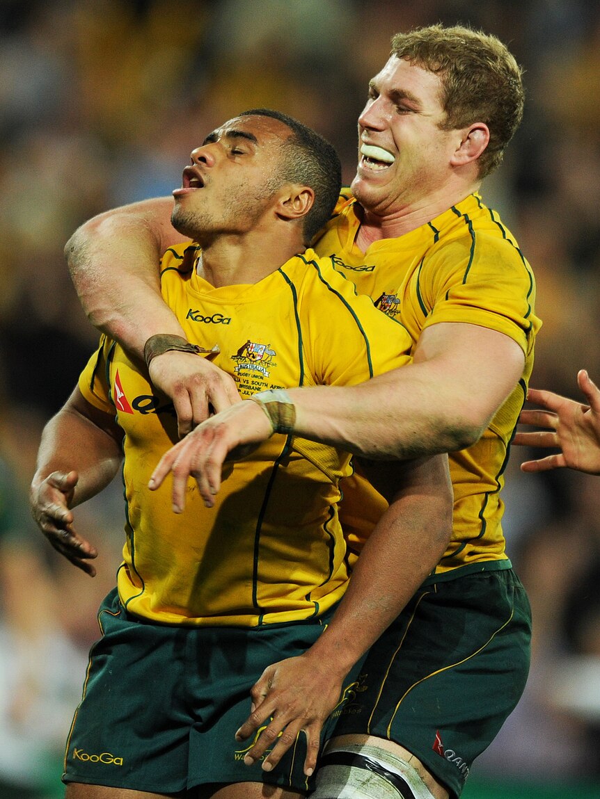 Pocock and Genia celebrate try