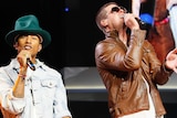 Pharrell Williams and Robin Thicke performing
