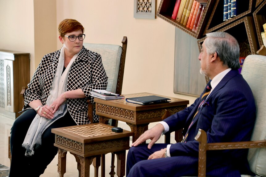 Marise Payne sitting down and speaking with Ashraf Ghani. 