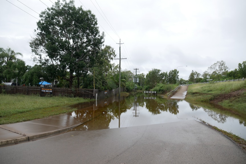 Stony Creek at Deeragun, in north-west Townsville, breaks its bank.