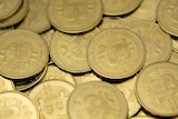 A pile of bitcoin tokens