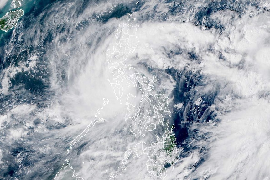 A satellite image of a large typhoon over the Philippines.