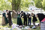 Canberra Library Tribe members take a bow after their performance of Rapunzel outside the National Library.