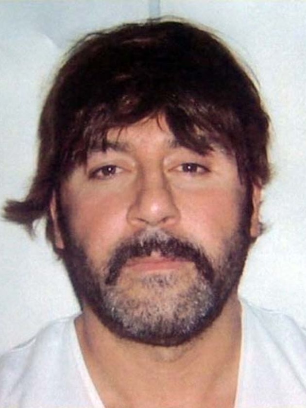 Convicted drug trafficker Tony Mokbel in disguise with a toupee and moustache.