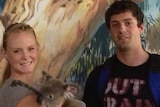 Christopher Lane with girlfriend Sarah Harper, holding a koala