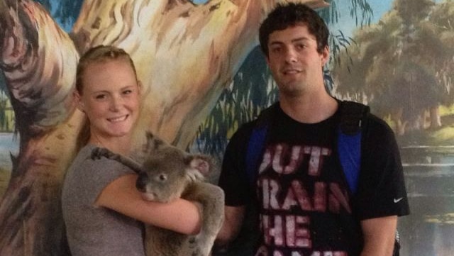 Christopher Lane with girlfriend Sarah Harper, holding a koala