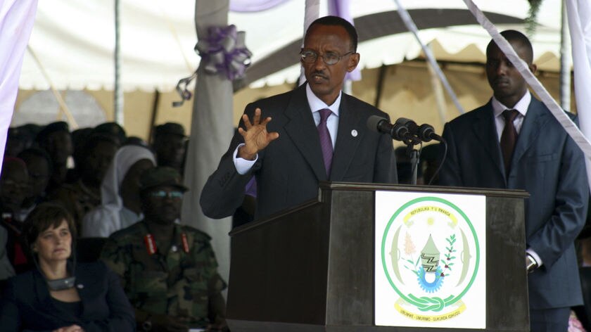 Rwanda's President Paul Kagame speaks behind a lectern.