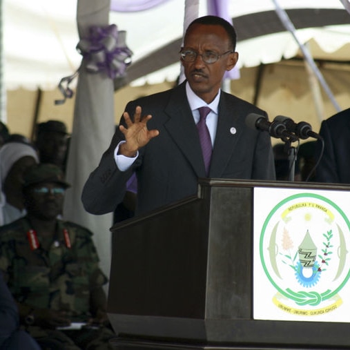 Rwanda's President Paul Kagame speaks behind a lectern.