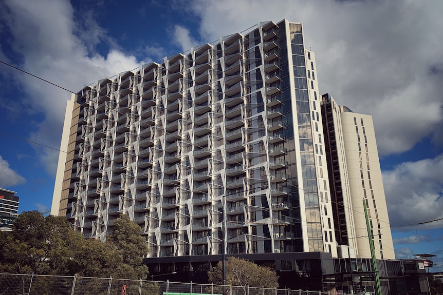 A large apartment complex on a sunny day.