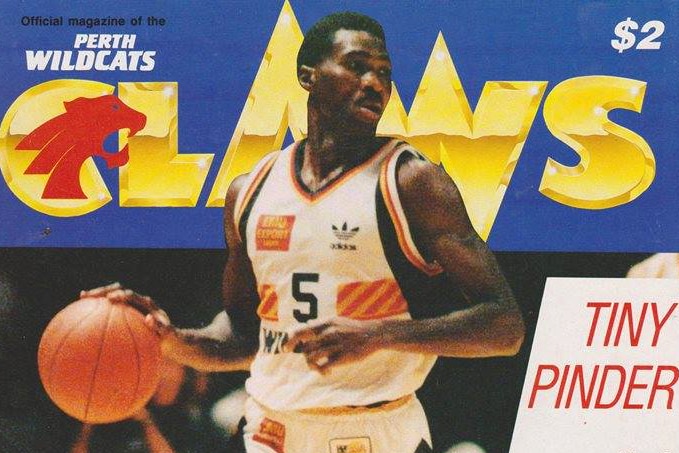 Tiny Pinder playing basketball on a amagazine cover in 1990