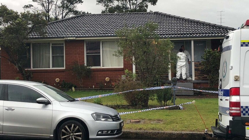 A house taped off with police tape